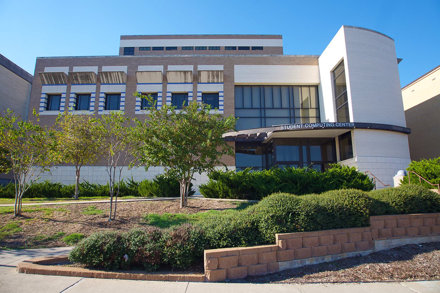 Exterior view of the Student Computing Center showcasing its modern architecture and landscaping.